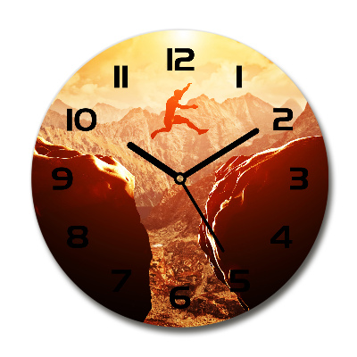 Reloj de cristal redondo Saltar sobre el abismo