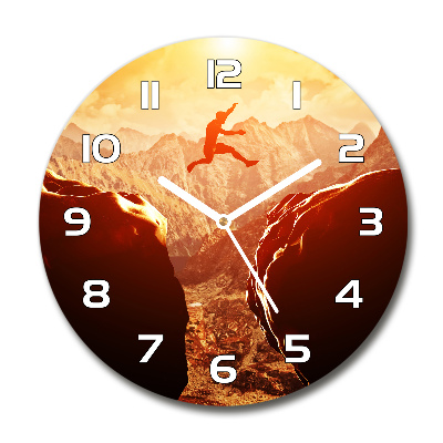 Reloj de cristal redondo Saltar sobre el abismo