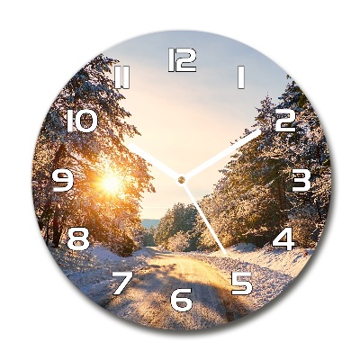 Reloj de cristal redondo Un camino en el bosque en invierno