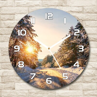 Reloj de cristal redondo Un camino en el bosque en invierno