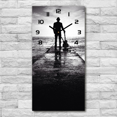 Reloj rectangular Guitarrista en el muelle