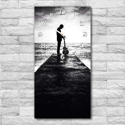 Reloj rectangular Guitarrista en el muelle