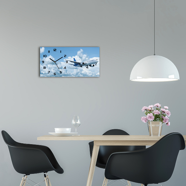 Reloj rectangular Un avión en el cielo