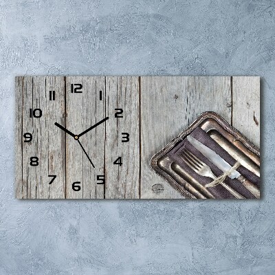 Reloj de cristal horizontal Cubiertos sobre tablas