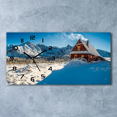 Reloj de cristal horizontal Una cabaña en las montañas