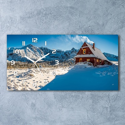 Reloj de cristal horizontal Una cabaña en las montañas