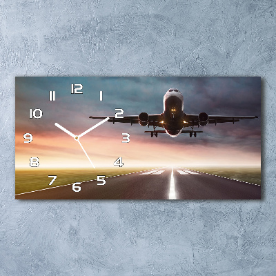 Reloj de cristal horizontal Un avión despegando