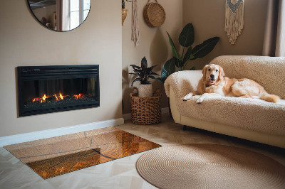 Placa protección suelo estufa Un patrón transversal de madera con veta distintiva