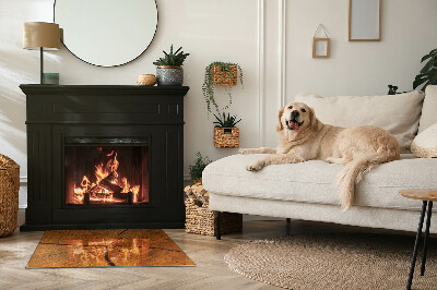 Placa protección suelo estufa Un patrón transversal de madera con veta distintiva