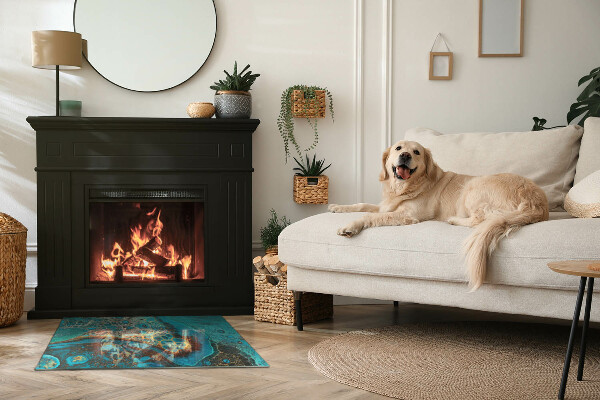 Placa protectora suelo estufa Un motivo expresivo con forma orgánica.