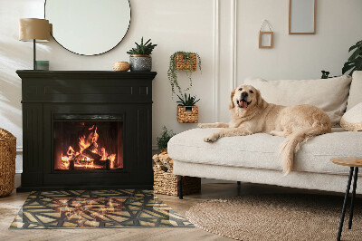 Placa protectora suelo estufa Patrones geométricos con fondo de madera.