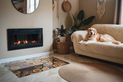 Protector suelo para estufa de leña Una caja con un motivo de madera dentada.