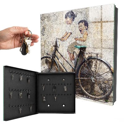 Armario para colgar llaves con diseño de niños y bicicleta