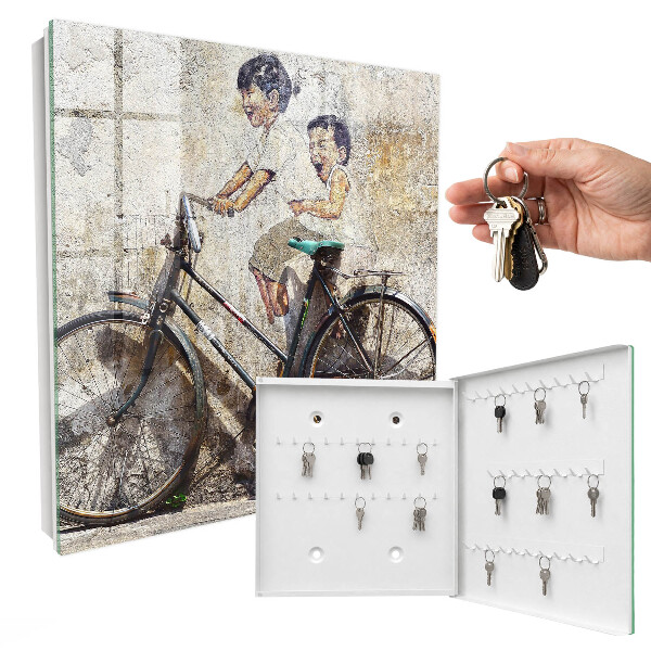 Armario para colgar llaves con diseño de niños y bicicleta