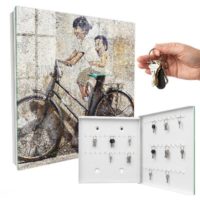Armario para colgar llaves con diseño de niños y bicicleta