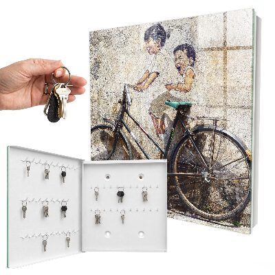 Armario para colgar llaves con diseño de niños y bicicleta