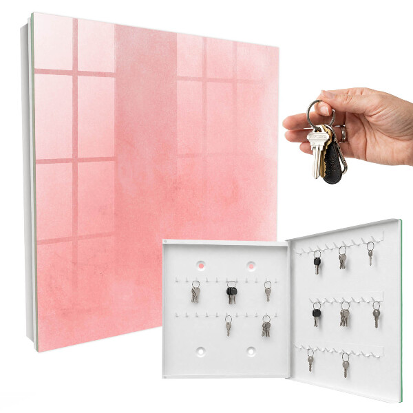 Armario para colgar llaves con diseño de fondo rosa