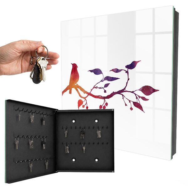 Armario para llaves con diseño de rama con pájaro