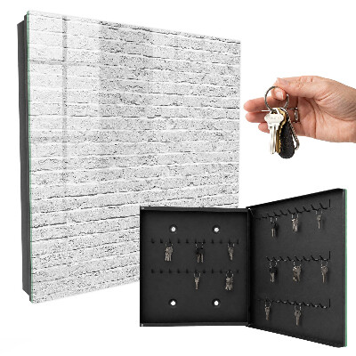 Caja para llaves con diseño de muro de ladrillo