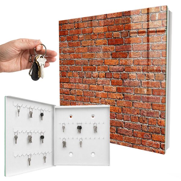 Armario para llaves con diseño de muro de ladrillo