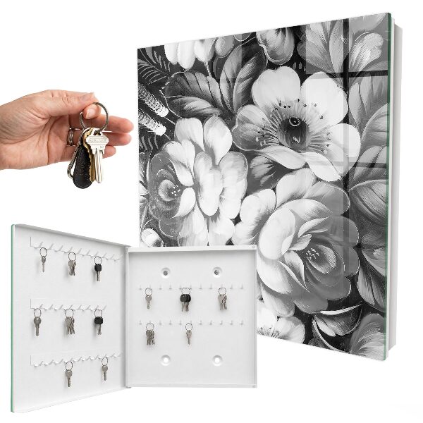 Armario para llaves con diseño de flores monocromáticas
