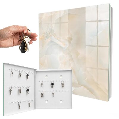 Caja para llaves de color crema para habitación