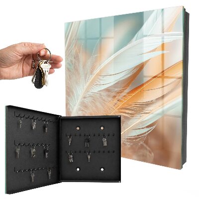 Armario para llaves con diseño de plumas en tonos pastel