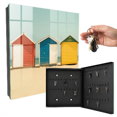Armario para llaves con diseño de casas coloridas