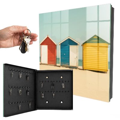 Armario para llaves con diseño de casas coloridas