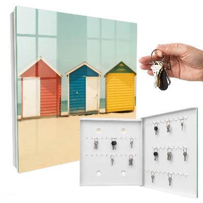 Armario para llaves con diseño de casas coloridas