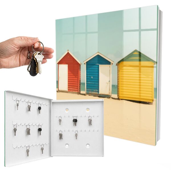 Armario para llaves con diseño de casas coloridas
