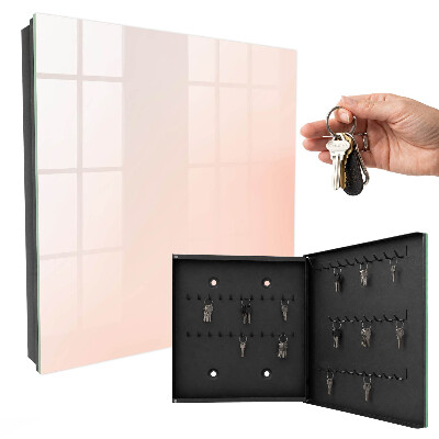 Armario para llaves con diseño minimalista en tonos pastel