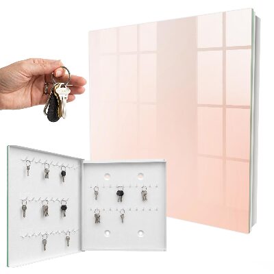 Armario para llaves con diseño minimalista en tonos pastel