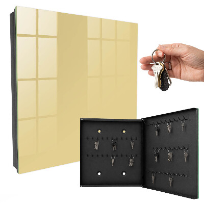 Armario para llaves de color beige amarillento