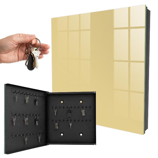 Armario para llaves de color beige amarillento