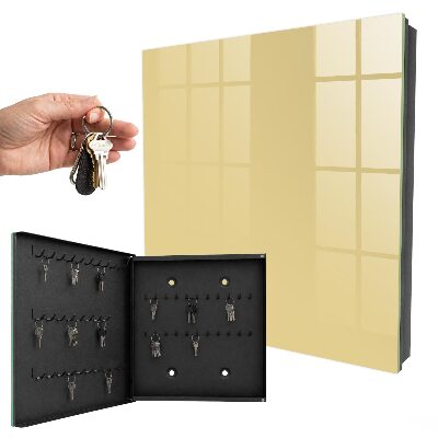 Armario para llaves de color beige amarillento