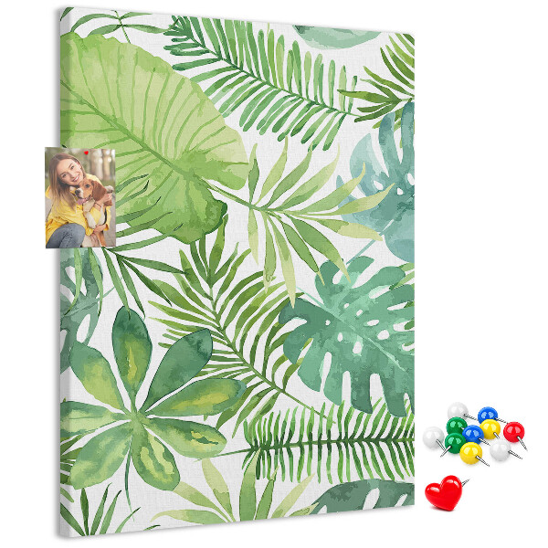 Tablero de corcho para pared Estampado de hojas tropicales en tonos verdes.