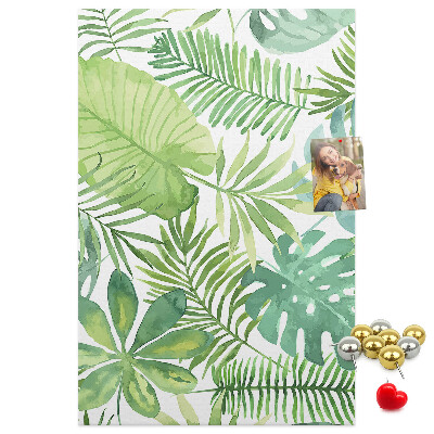 Tablero de corcho para pared Estampado de hojas tropicales en tonos verdes.