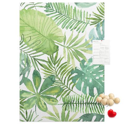 Tablero de corcho para pared Estampado de hojas tropicales en tonos verdes.