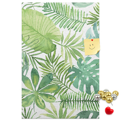 Tablero de corcho para pared Estampado de hojas tropicales en tonos verdes.