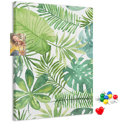 Tablero de corcho para pared Estampado de hojas tropicales en tonos verdes.
