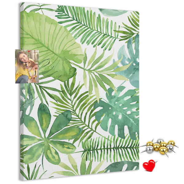 Tablero de corcho para pared Estampado de hojas tropicales en tonos verdes.