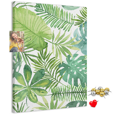 Tablero de corcho para pared Estampado de hojas tropicales en tonos verdes.