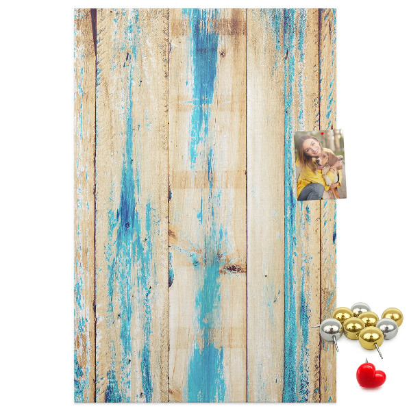 Decoración pizarra de corcho Panel de madera antiguo con detalles azules.