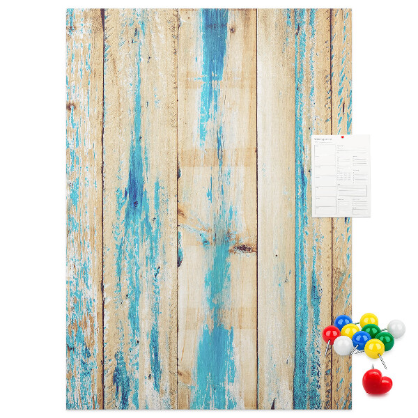 Decoración pizarra de corcho Panel de madera antiguo con detalles azules.
