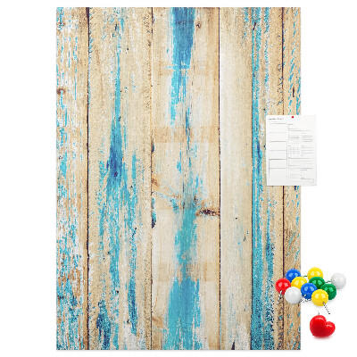 Decoración pizarra de corcho Panel de madera antiguo con detalles azules.
