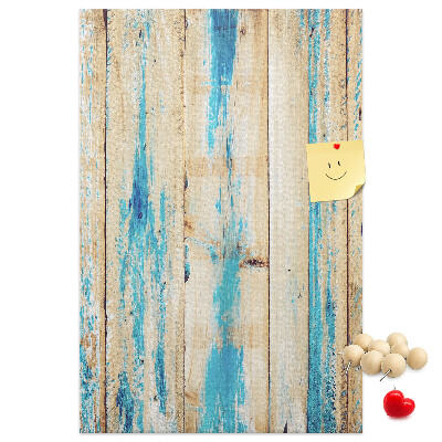 Decoración pizarra de corcho Panel de madera antiguo con detalles azules.