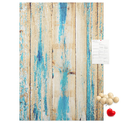 Decoración pizarra de corcho Panel de madera antiguo con detalles azules.