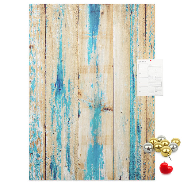 Decoración pizarra de corcho Panel de madera antiguo con detalles azules.