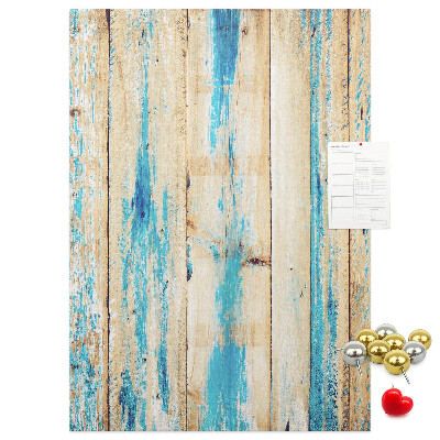 Decoración pizarra de corcho Panel de madera antiguo con detalles azules.